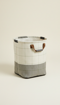 Folding laundry caddy with mesh compartments